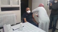 اول جرعةللتلقيح ضد فيروس كورونا تلقاهابأكادير الدكتور رشدي قدار