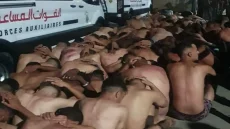 البرلمان يستدعي 3 وزراء بعد أحداث “الهروب الكبير”… وإنتشار صور لمهاجرين عراة